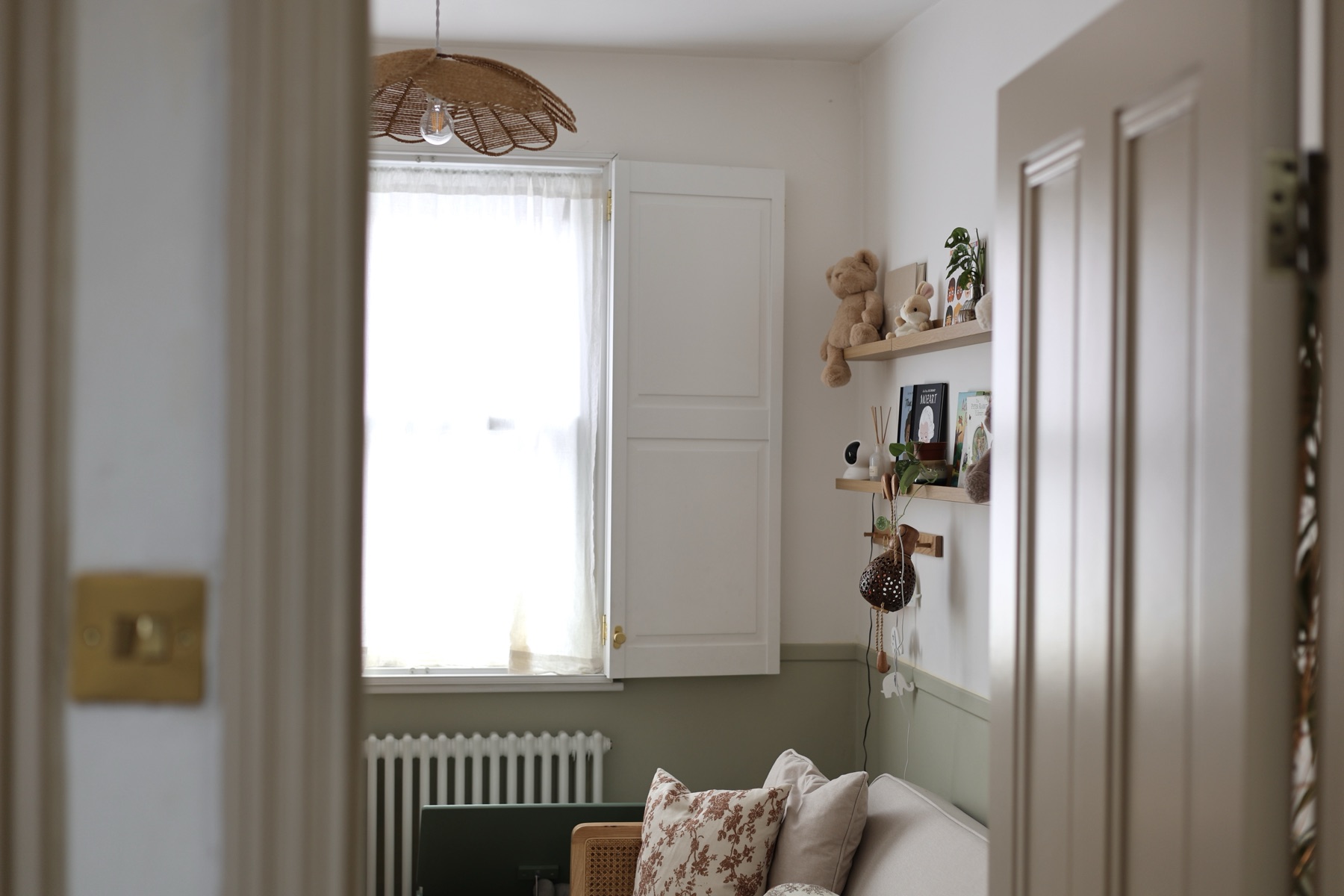 A softly framed view into the baby room