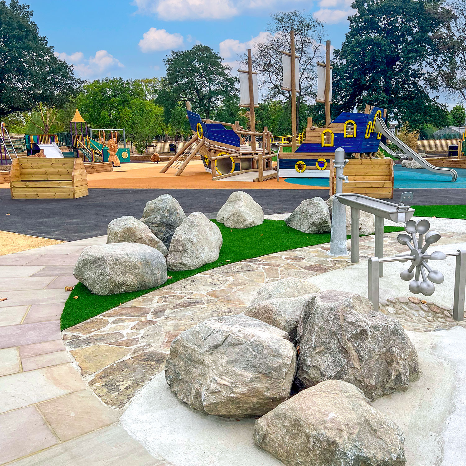 The colourful playground and water play area in West Ham Park